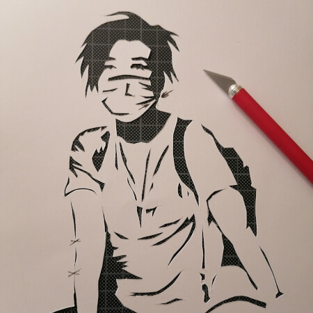 ausgeschnittenes Stencil - Junge mit Fahrrad